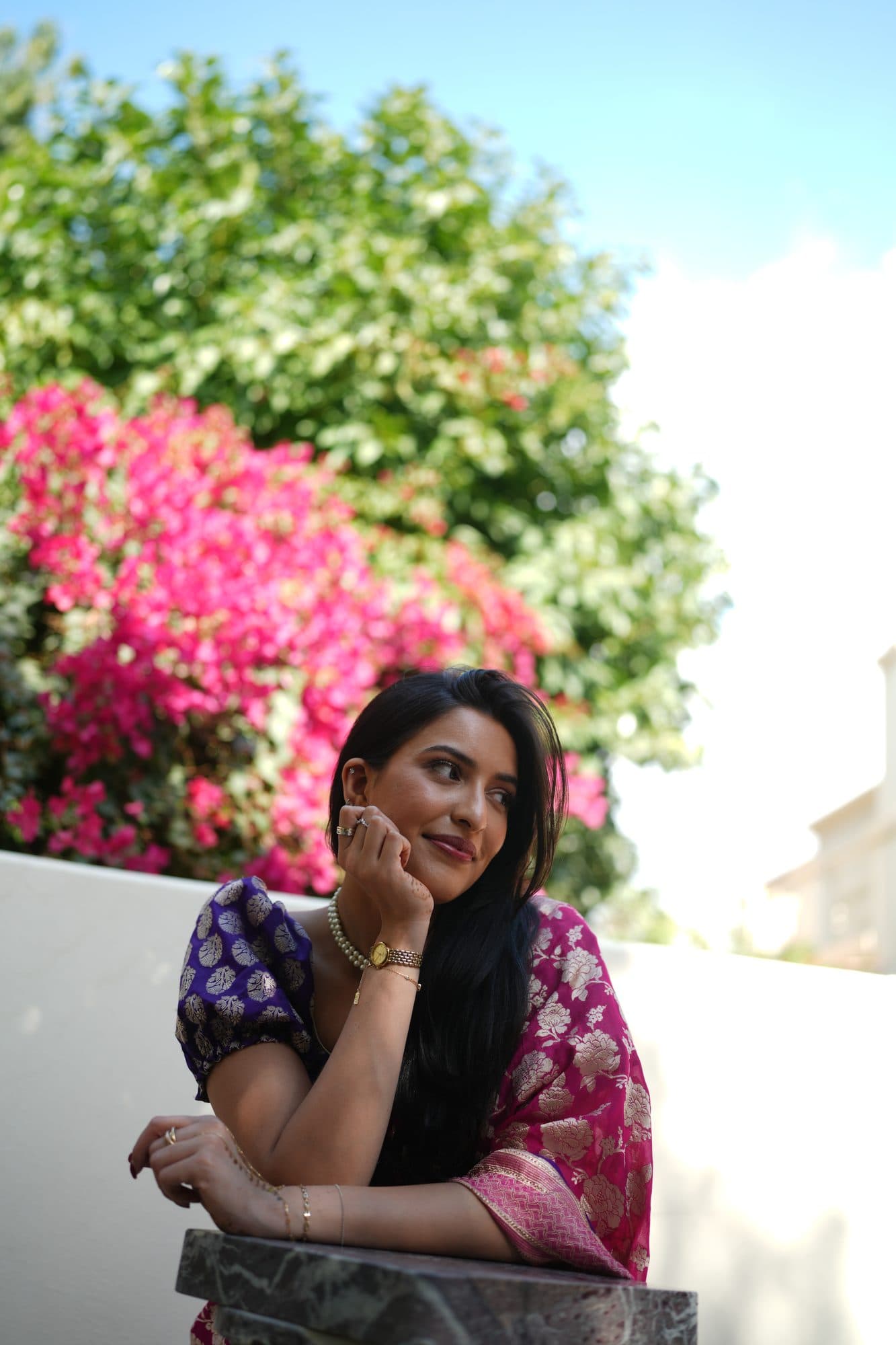 Seated by the bougainvillea